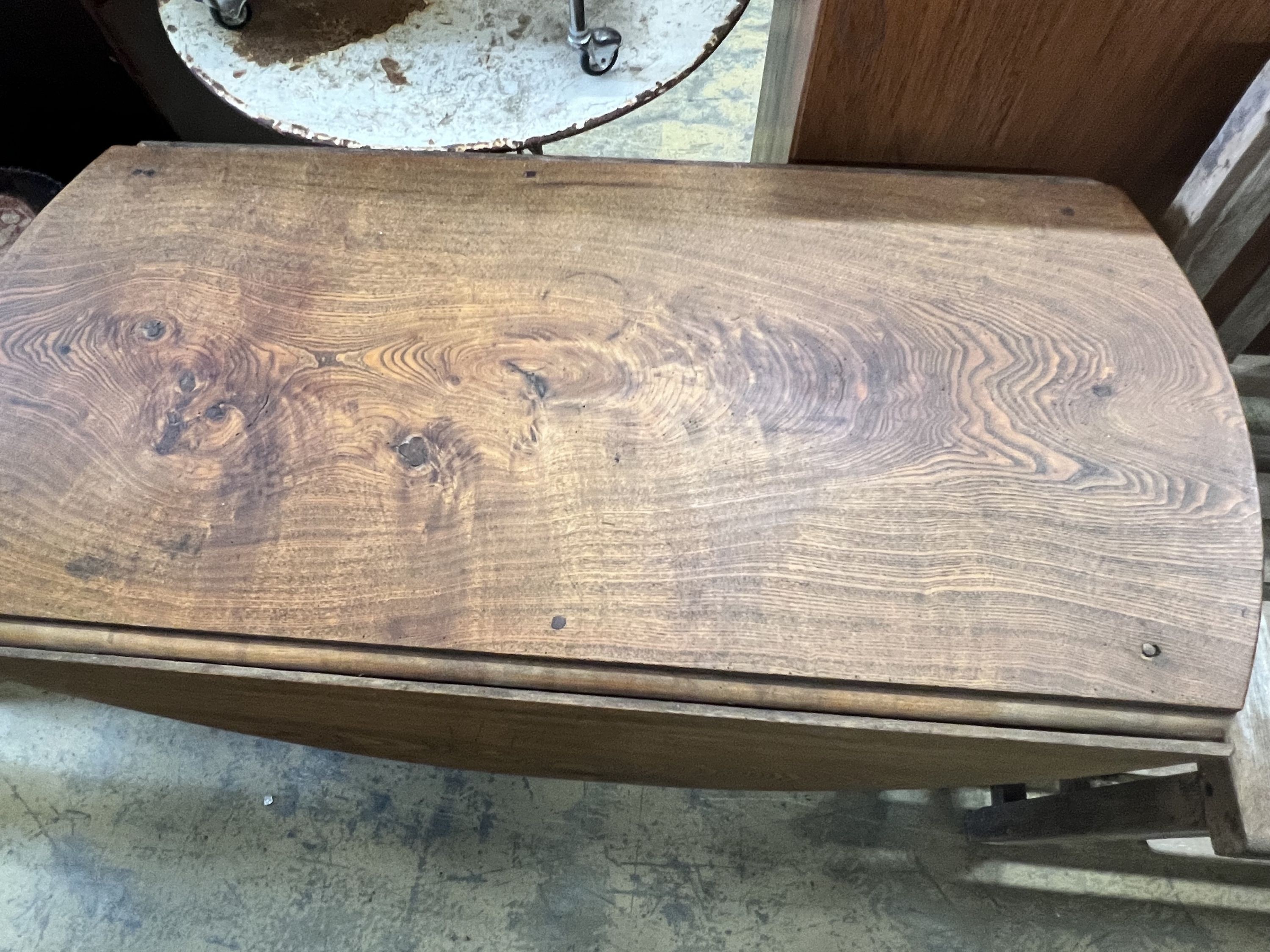 A 19th century provincial ash drop leaf table, width 120cm depth 58cm height 76cm